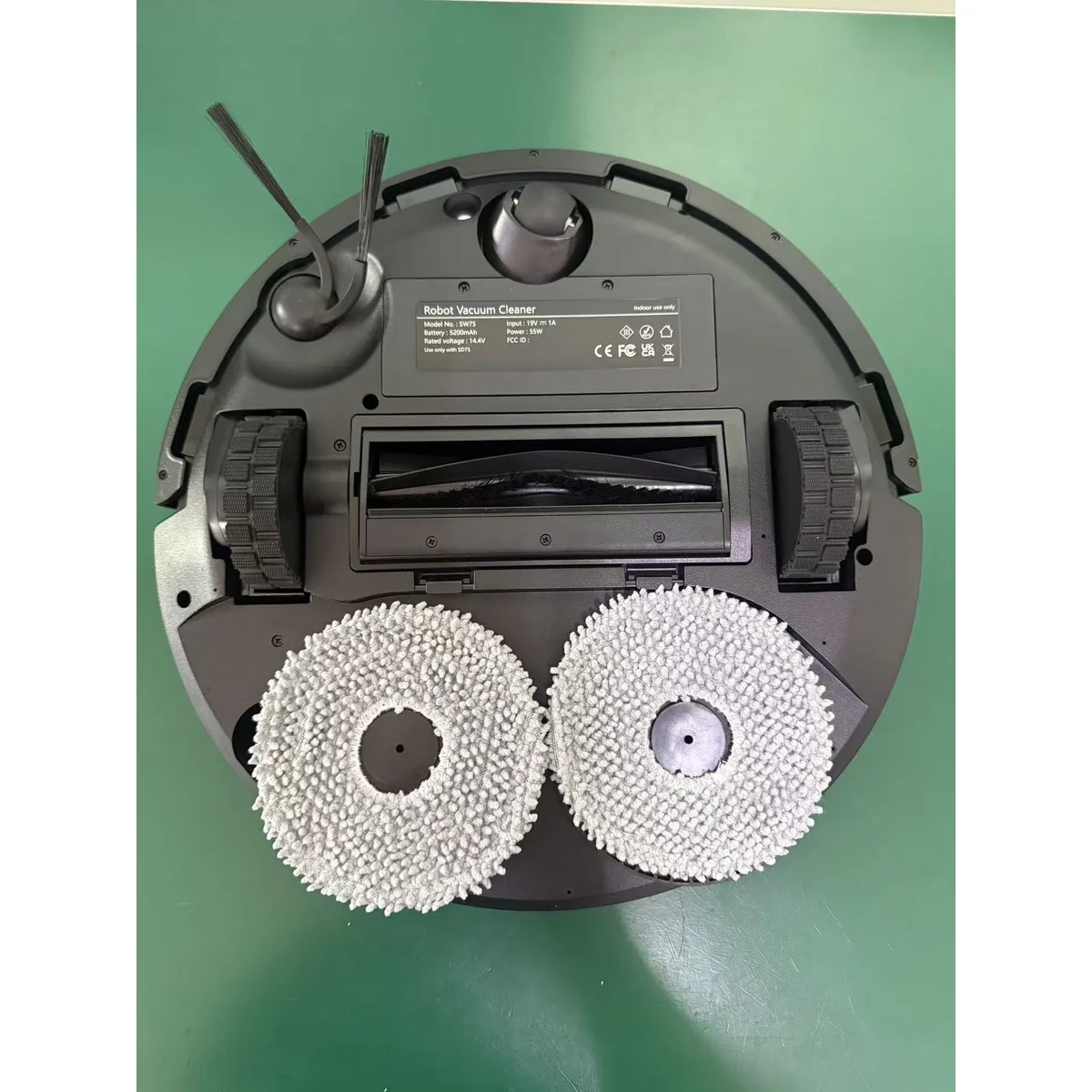 SW75 underside with dual rotating mop pads, main brush and side brush