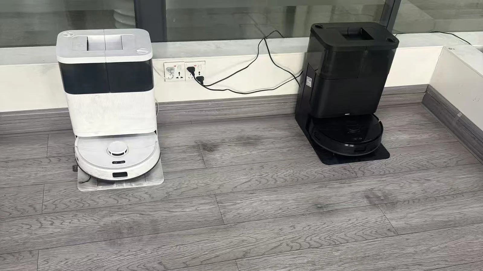 SW75 all-in-one stations in white and black side by side